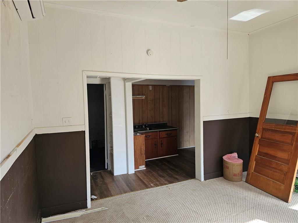 716 Hawthorne Street Vandergrift, PA 15690 - Photo 8 of 11 a kitchen with a refrigerator and stove