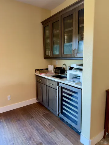 a kitchen with a sink and cabinets