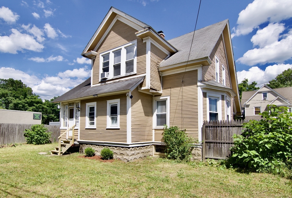 16 Amity Court Springfield, MA 01108 - Photo 2 of 42 a front view of a house with a yard