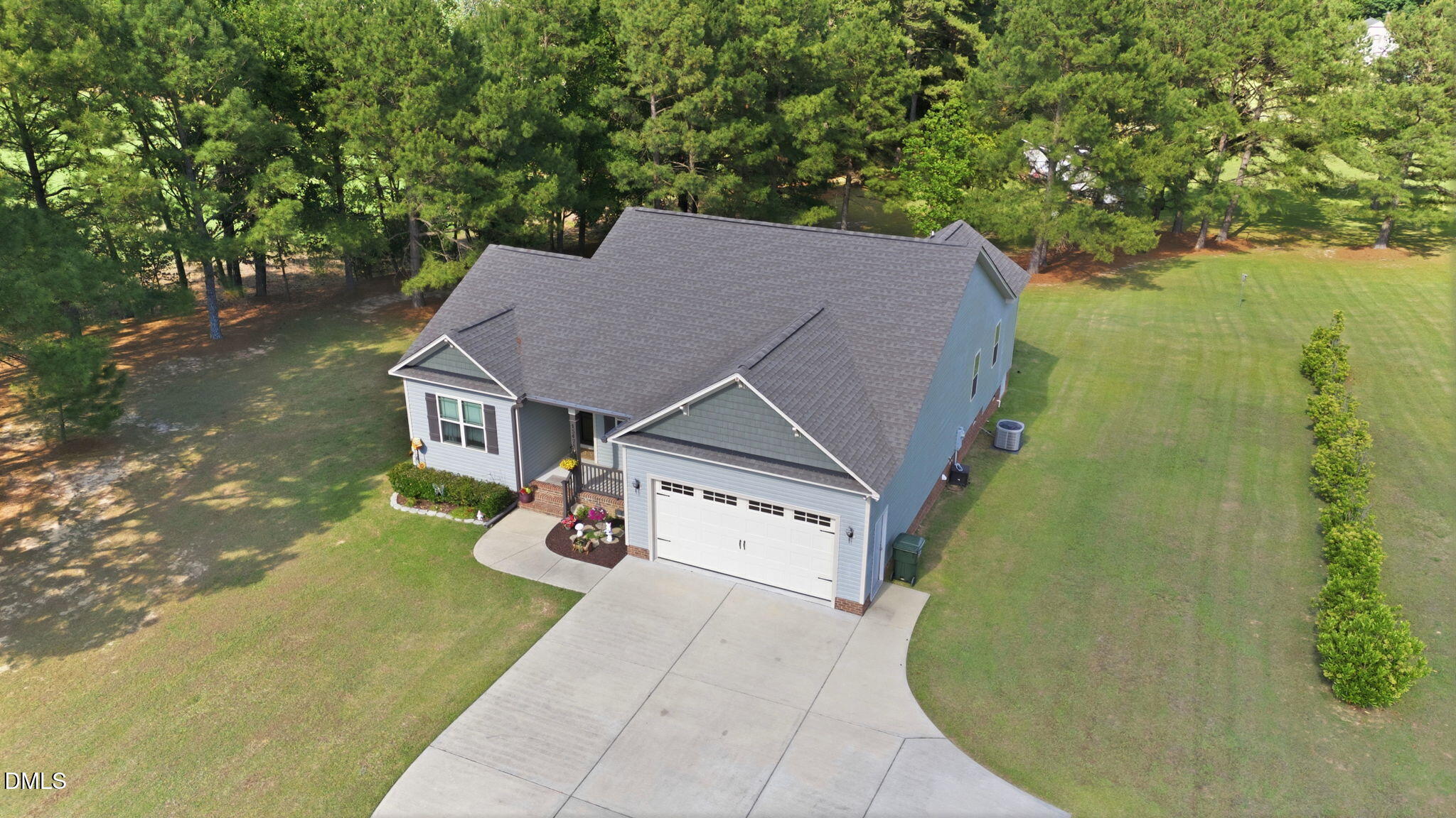 1547 Lassiter Pond Road Four Oaks, NC 27524 - Photo 4 of 45 a aerial view of a house