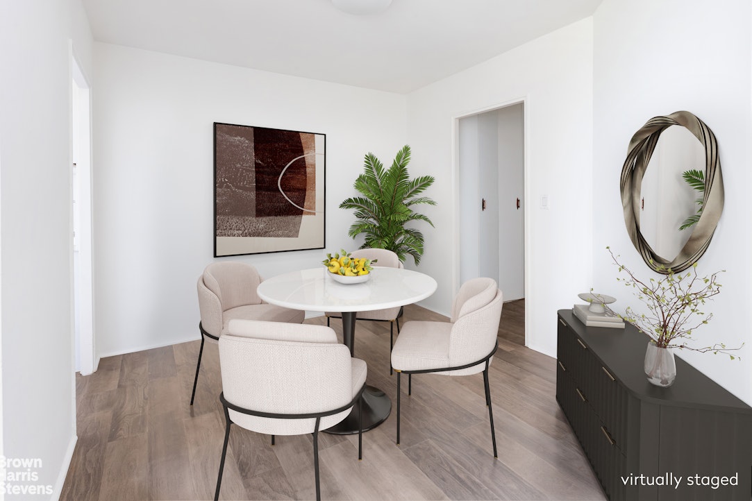 5700 Arlington Avenue, Unit 11X Bronx, NY 10471 - Photo 4 of 21 a dining room with furniture and wooden floor