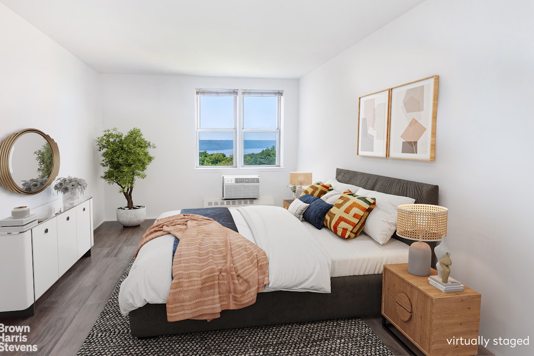 5700 Arlington Avenue, Unit 11X Bronx, NY 10471 - Photo 6 of 21 a bedroom with bed and window