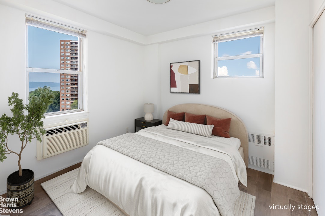 5700 Arlington Avenue, Unit 11X Bronx, NY 10471 - Photo 8 of 21 a bedroom with a bed and a window