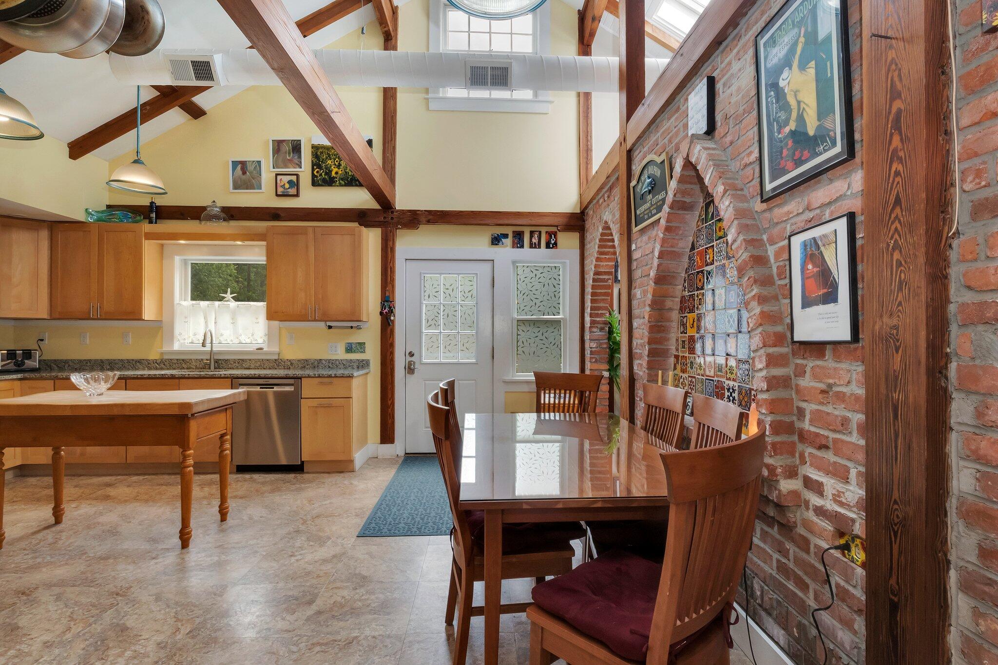 36 Bakers Pond Road Orleans, MA 02653 - Photo 12 of 50 a view of living room kitchen and dining room