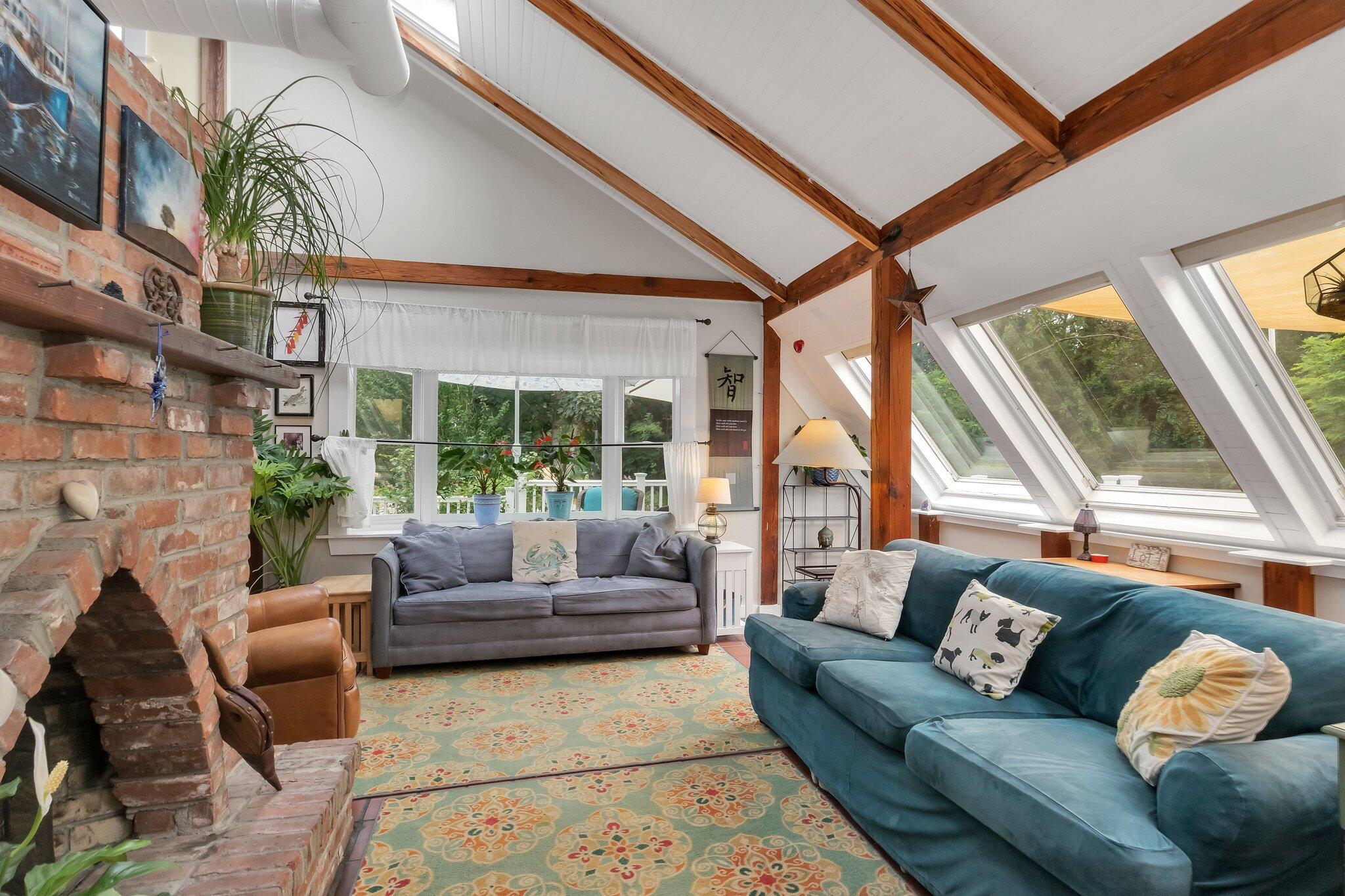 36 Bakers Pond Road Orleans, MA 02653 - Photo 15 of 50 a living room with furniture and a large window