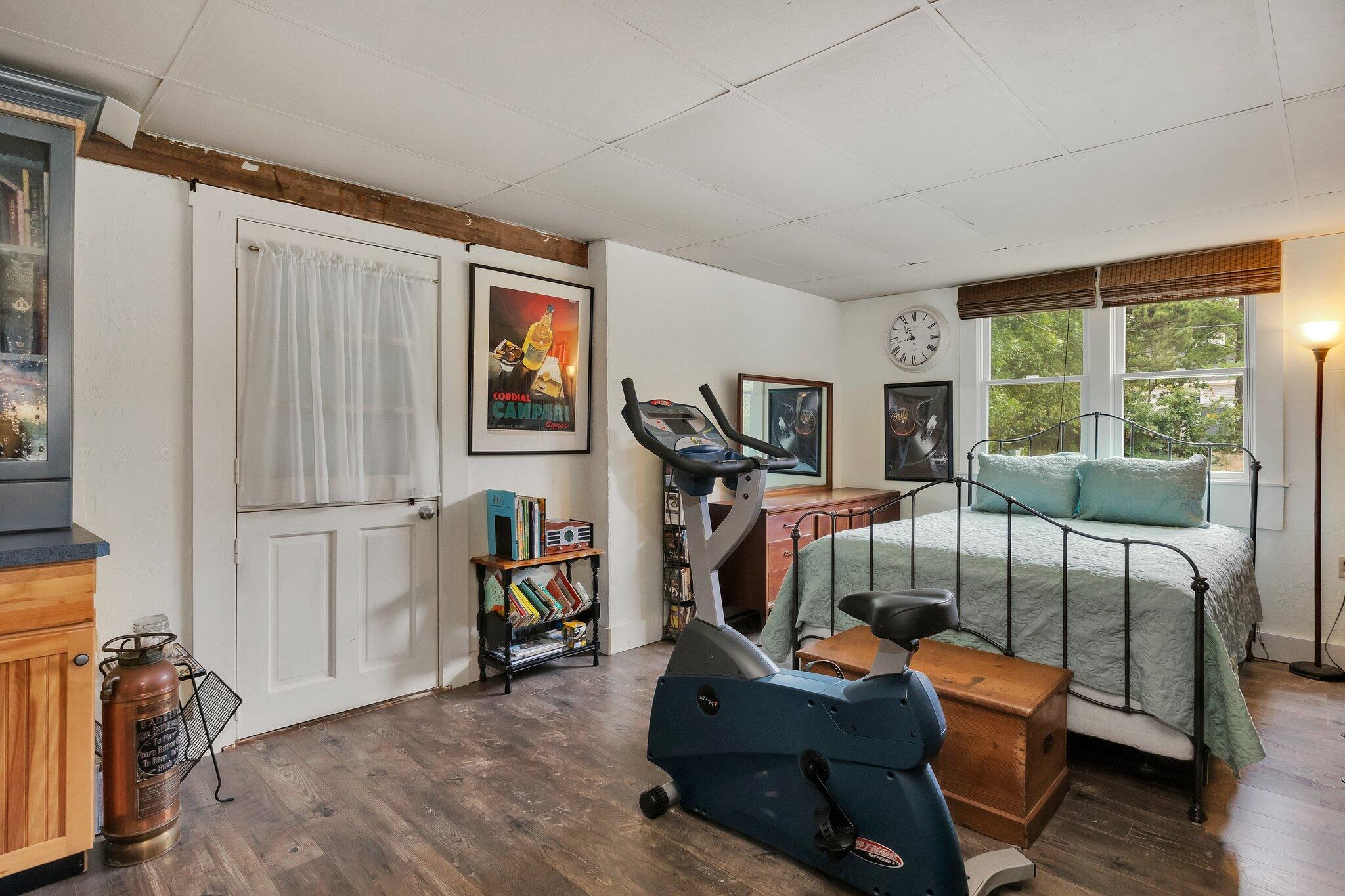 36 Bakers Pond Road Orleans, MA 02653 - Photo 18 of 50 a bedroom with furniture and a window