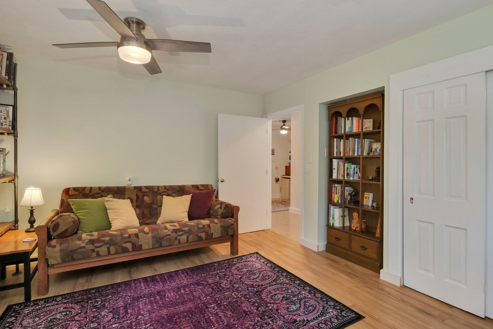 36 Bakers Pond Road Orleans, MA 02653 - Photo 20 of 50 a living room with furniture and a rug