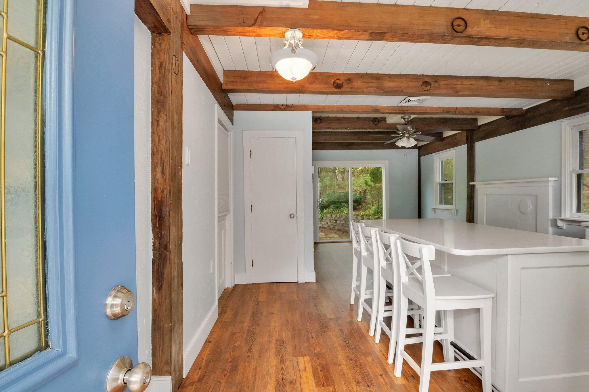 36 Bakers Pond Road Orleans, MA 02653 - Photo 24 of 50 a view of a hallway with wooden floor and staircase
