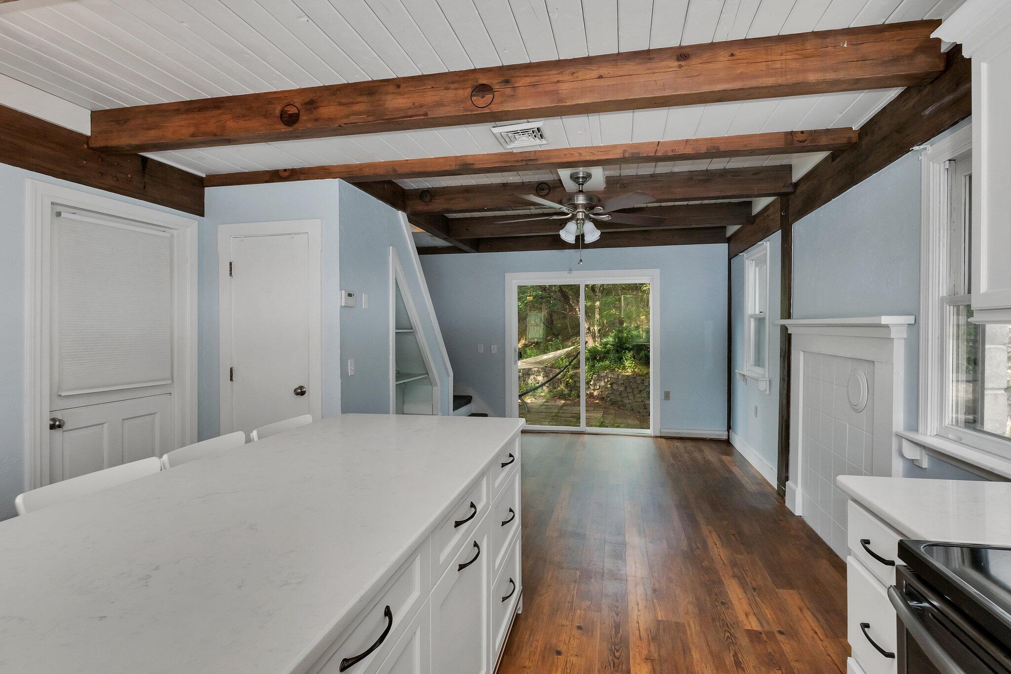 36 Bakers Pond Road Orleans, MA 02653 - Photo 27 of 50 a view of a room with wooden floors and windows