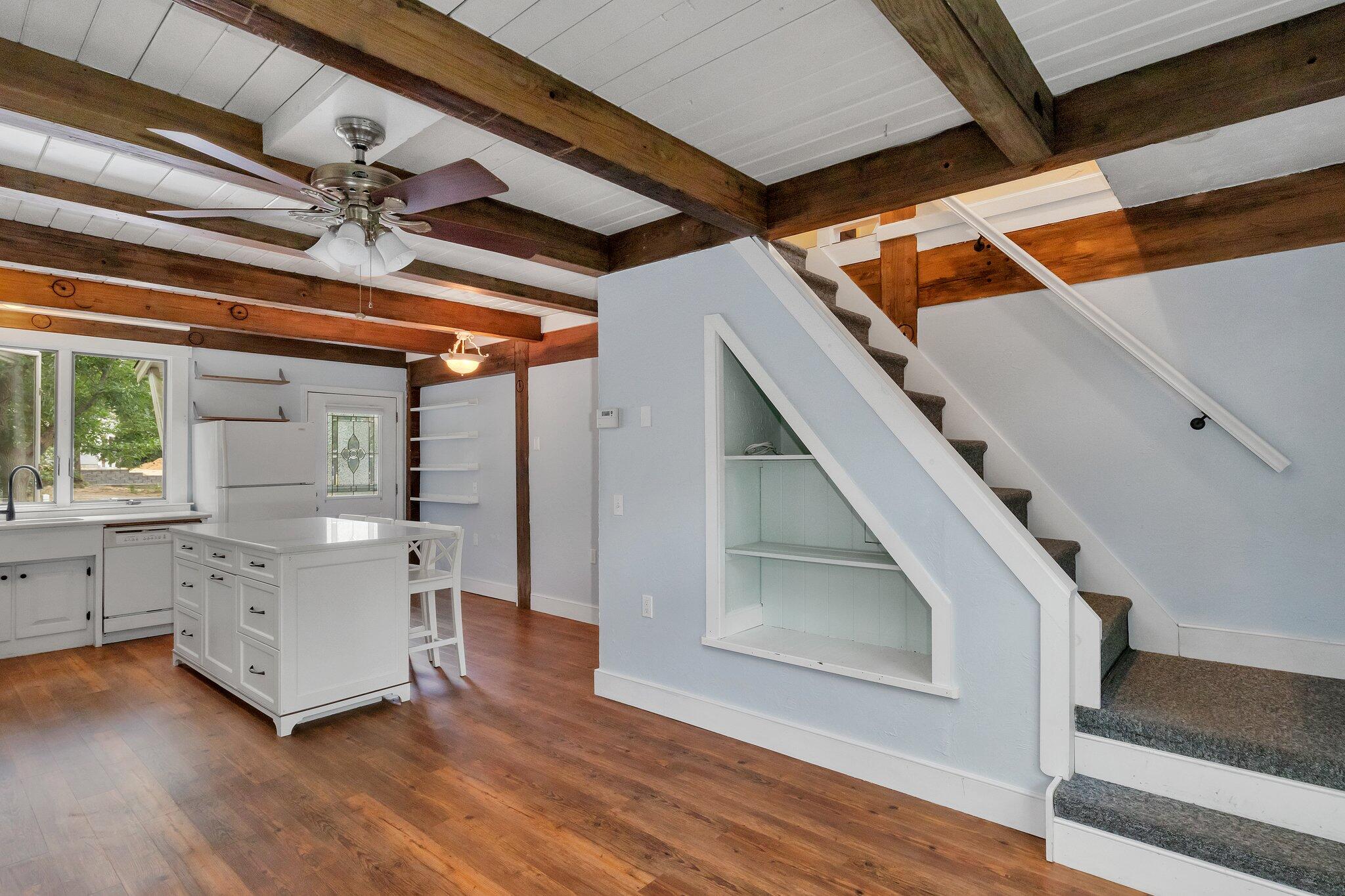 36 Bakers Pond Road Orleans, MA 02653 - Photo 30 of 50 a view of a room with wooden floor and staircase