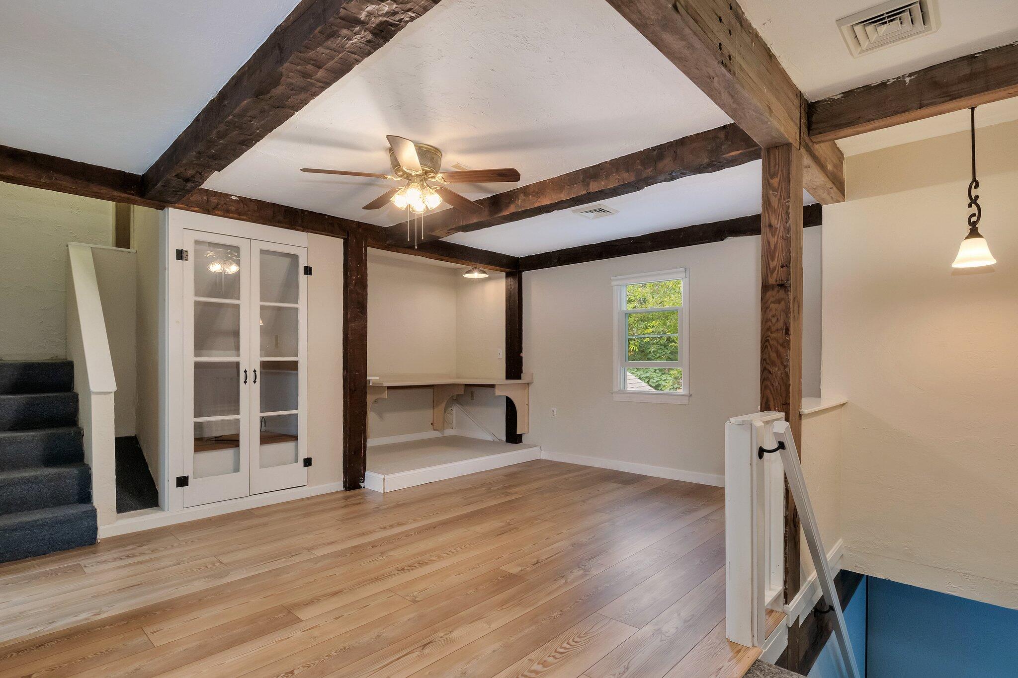 36 Bakers Pond Road Orleans, MA 02653 - Photo 31 of 50 a view of empty room with wooden floor and fan