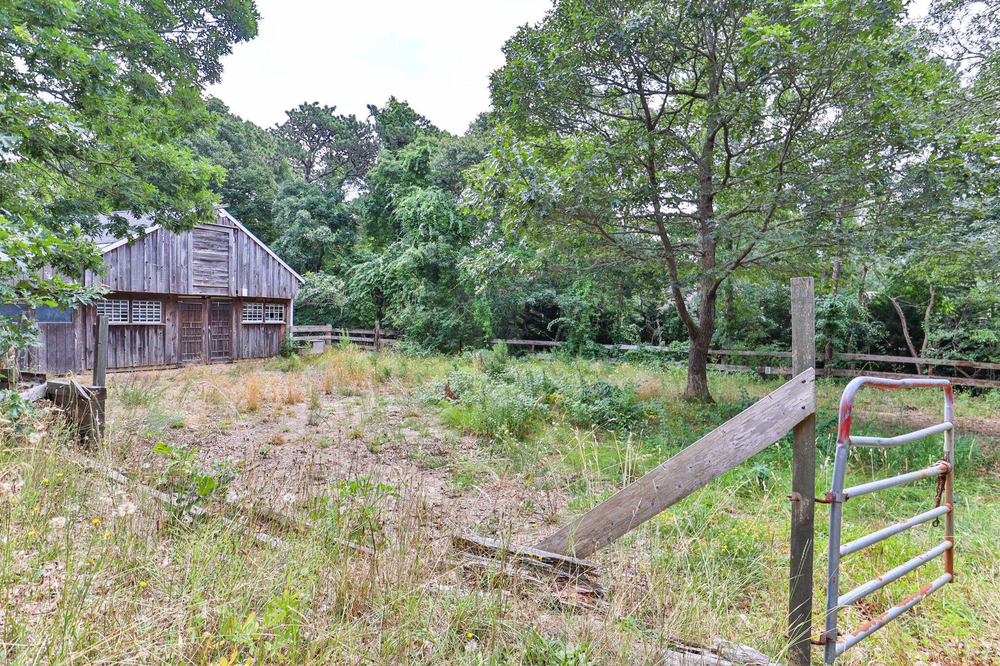 36 Bakers Pond Road Orleans, MA 02653 - Photo 45 of 50 a view of a house with a backyard