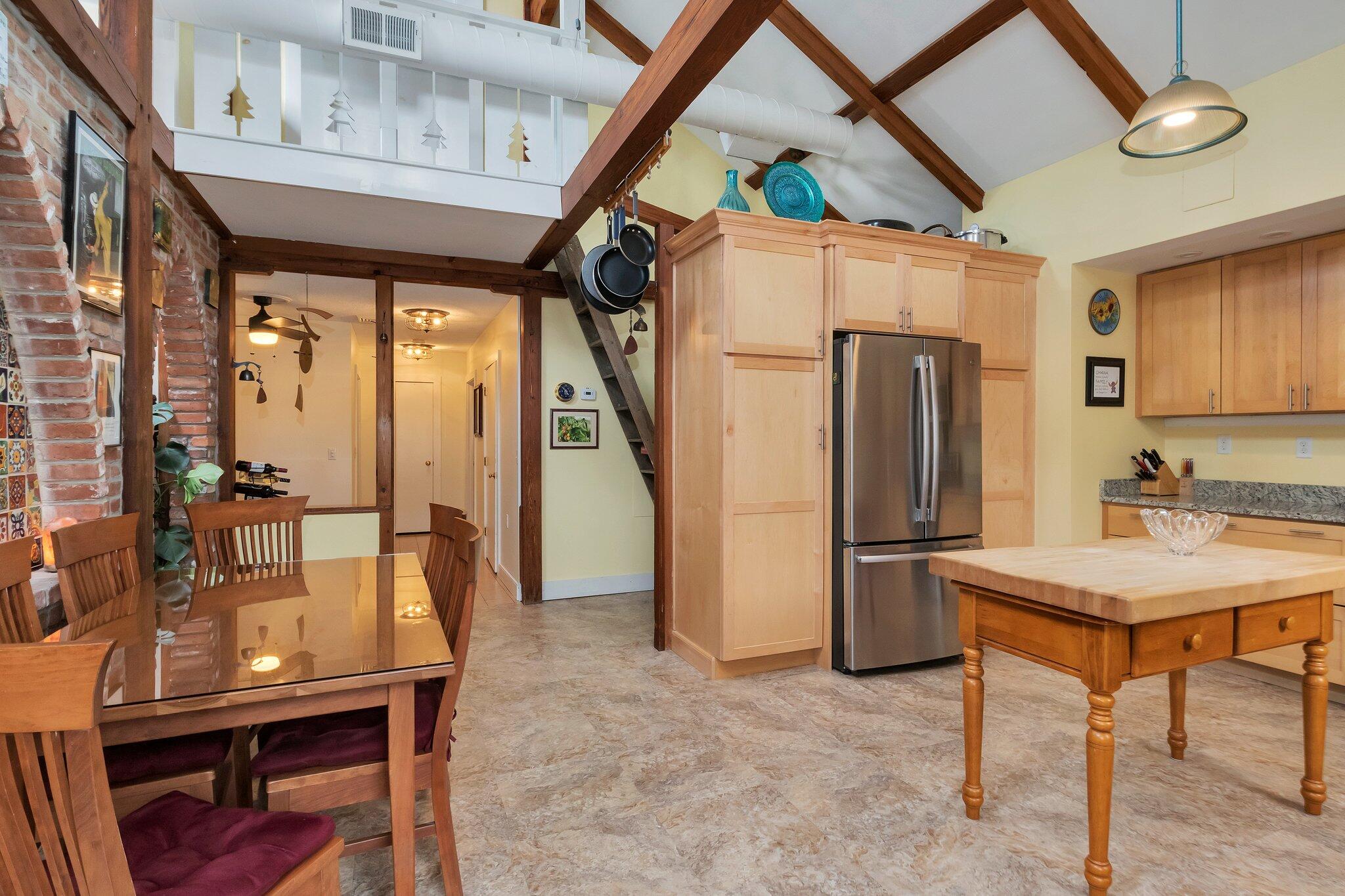 36 Bakers Pond Road Orleans, MA 02653 - Photo 10 of 50 a kitchen with refrigerator and window
