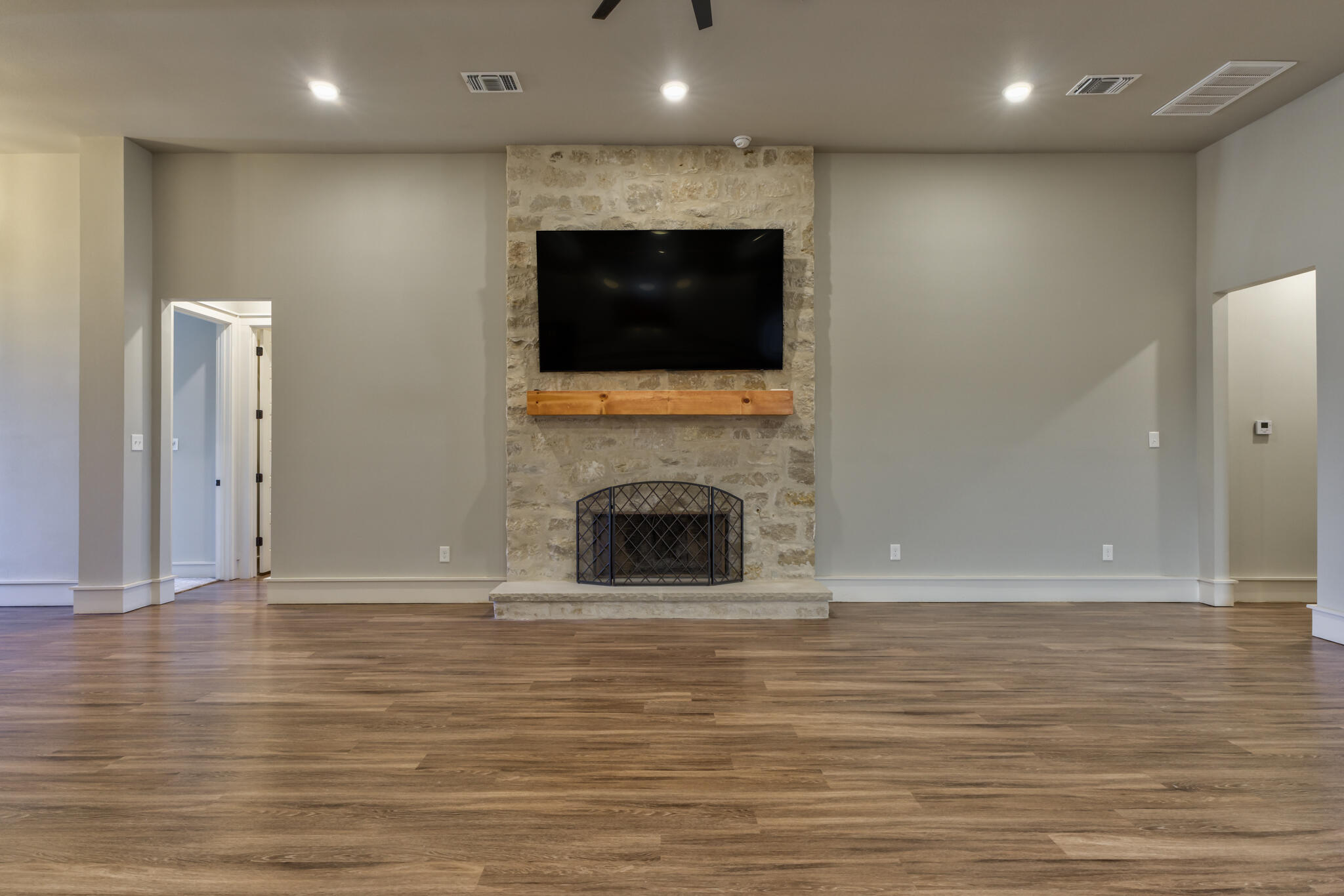 5303 110th Street Lubbock, TX 79424 - Photo 13 of 54 a view of a livingroom with a fireplace
