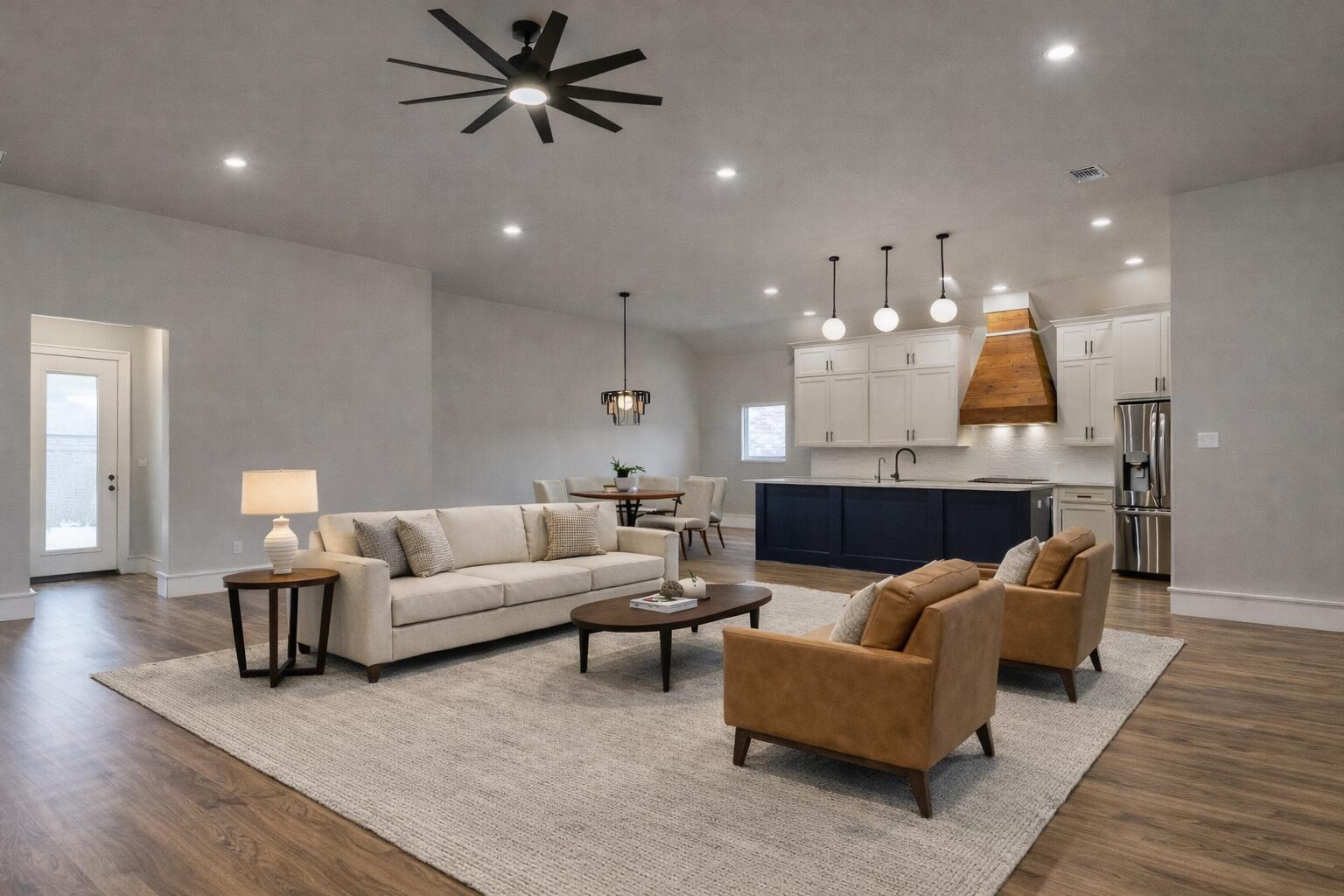 5303 110th Street Lubbock, TX 79424 - Photo 6 of 54 a living room with furniture and kitchen view