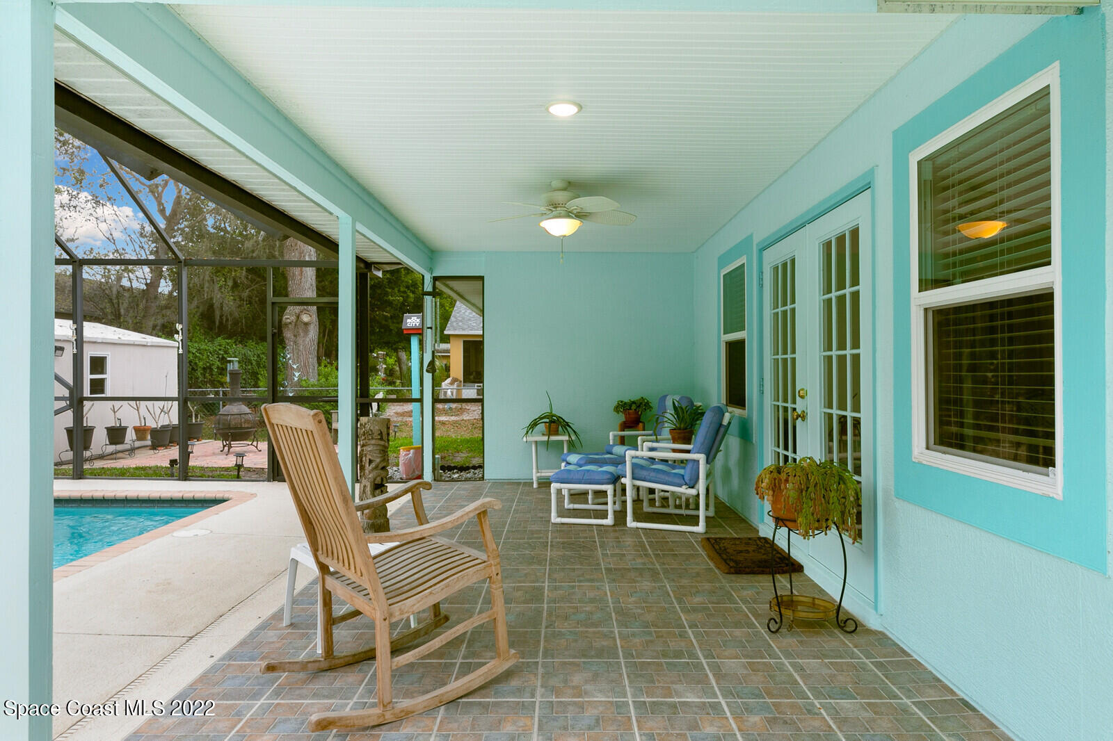 4885 Doreen Road Cocoa, FL 32927 - Photo 11 of 21 a building outdoor space with patio furniture and potted plants