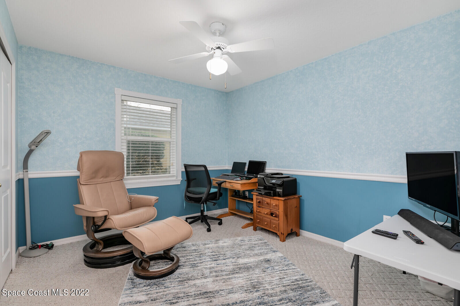 4885 Doreen Road Cocoa, FL 32927 - Photo 14 of 21 a workspace with furniture and a window