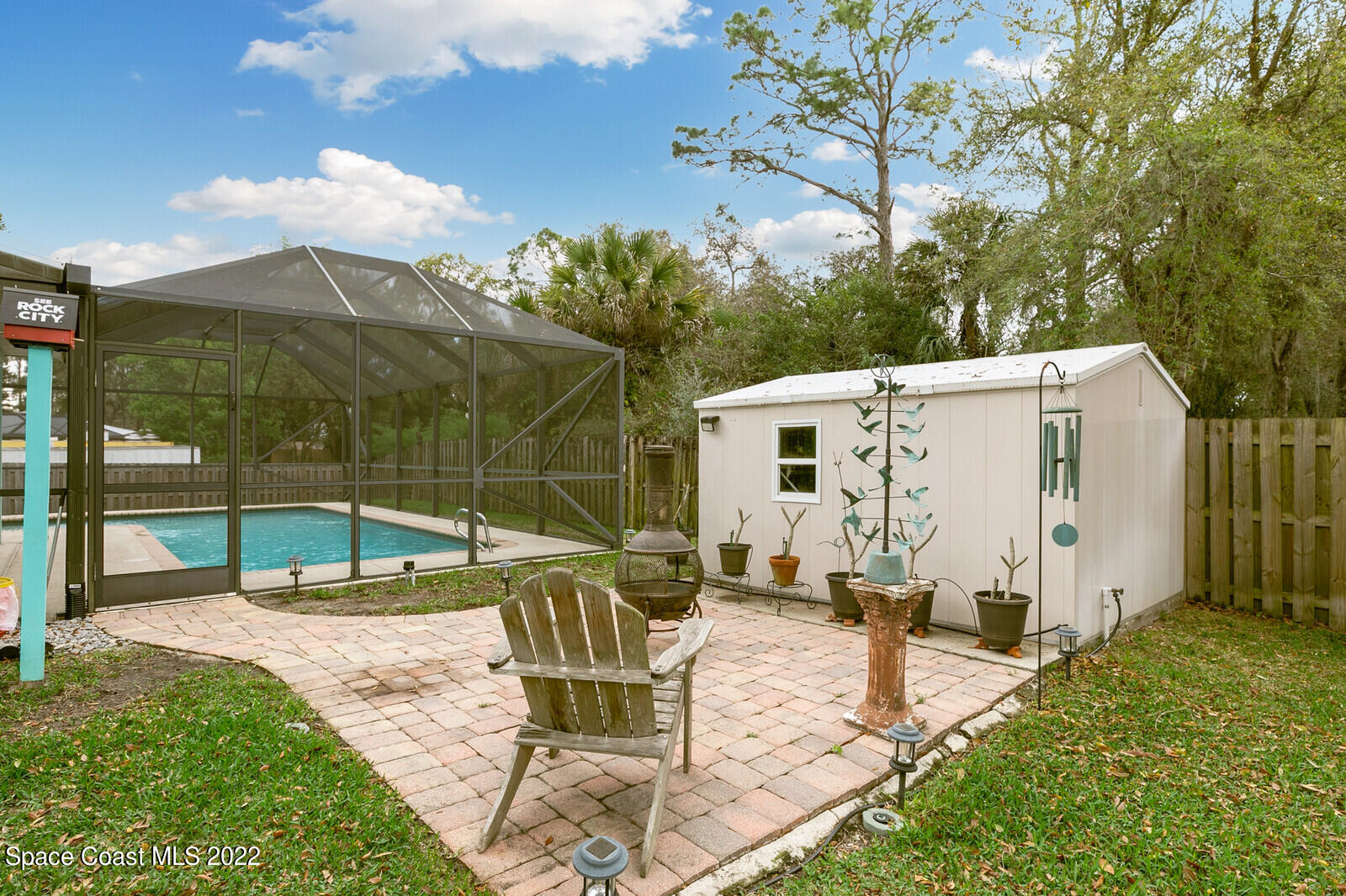 4885 Doreen Road Cocoa, FL 32927 - Photo 3 of 21 a view of a patio with a table and chairs