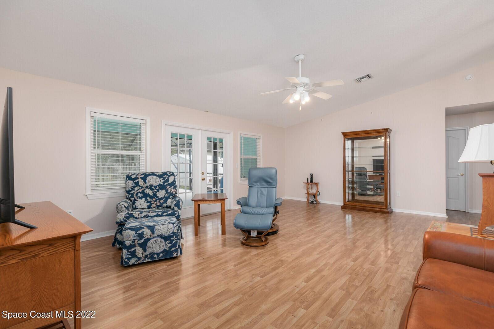 4885 Doreen Road Cocoa, FL 32927 - Photo 4 of 21 a living room with furniture and wooden floor