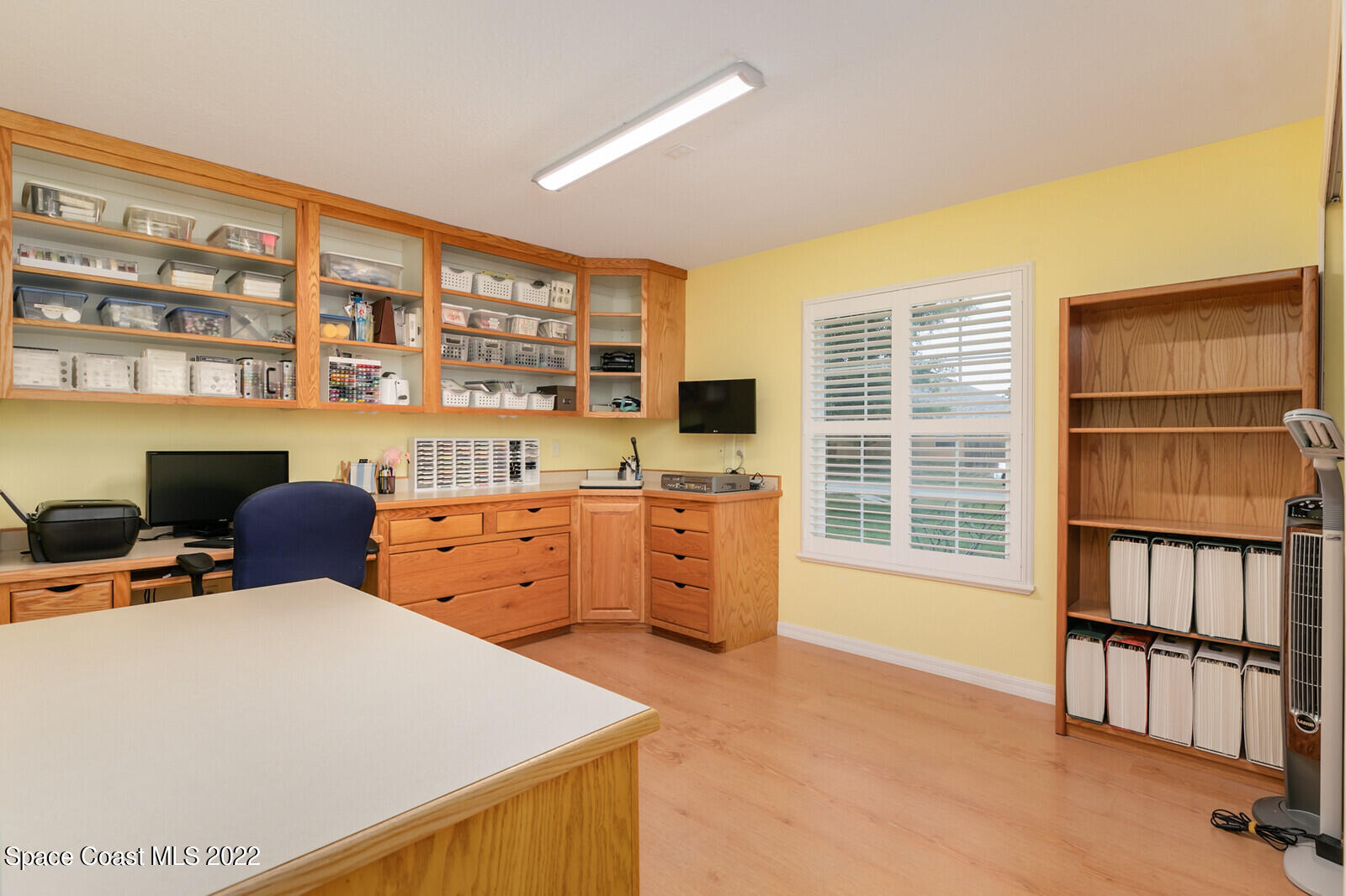 4885 Doreen Road Cocoa, FL 32927 - Photo 10 of 21 a bed room with furniture and a window