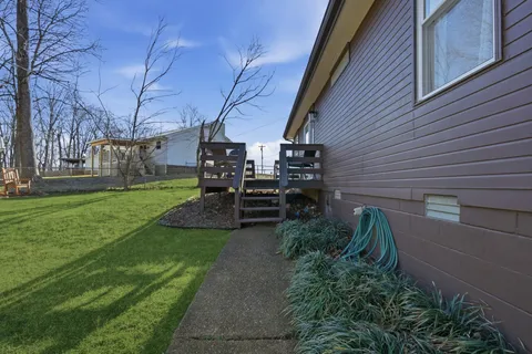 a view of a patio in backyard