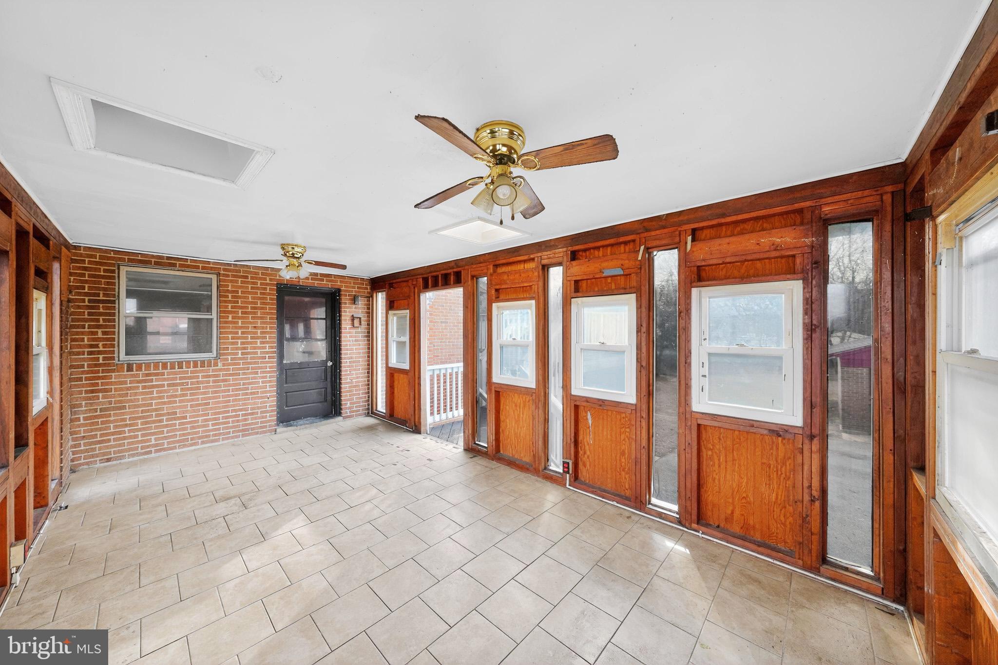 9300 Allentown Road Fort Washington, MD 20744 - Photo 9 of 33 a view of a livingroom with a ceiling fan and window