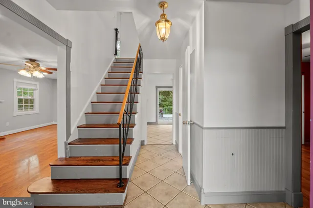a kitchen that has a sink and a stove in it