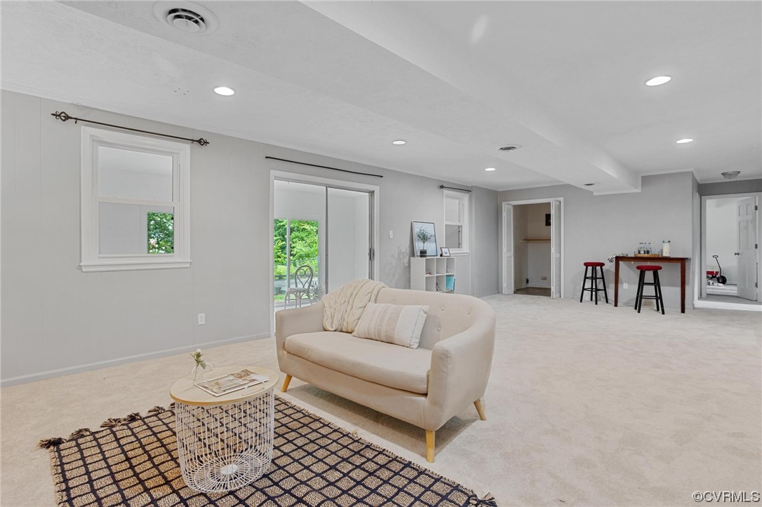 12912 Middlebrook Road Chester, VA 23831 - Photo 29 of 43 a living room with furniture and a table