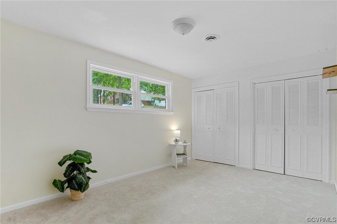 12912 Middlebrook Road Chester, VA 23831 - Photo 32 of 43 Bedroom #4 in the basement with a double closet and windows