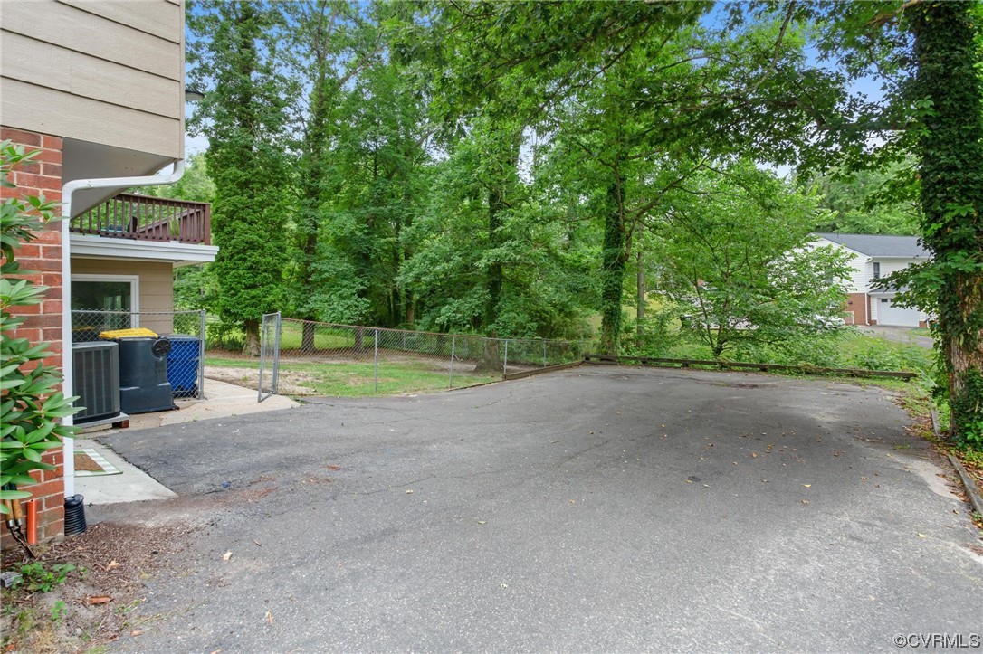 12912 Middlebrook Road Chester, VA 23831 - Photo 40 of 43 Side view of rear driveway and parking