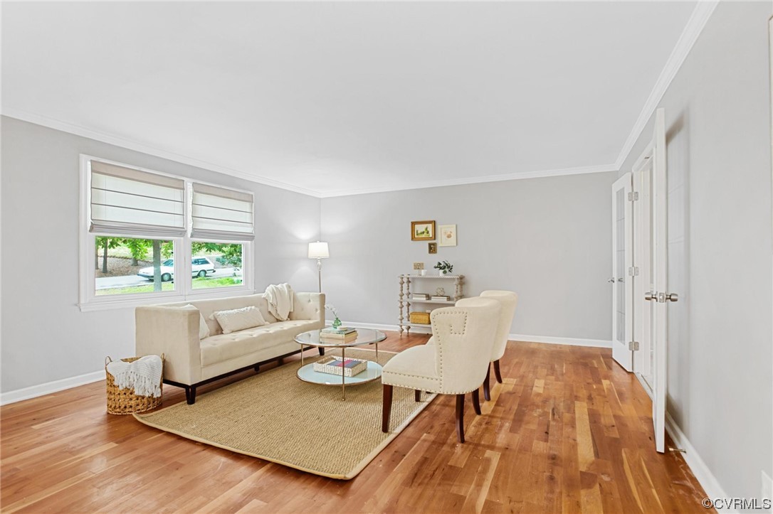 12912 Middlebrook Road Chester, VA 23831 - Photo 5 of 43 a living room with furniture and a wooden floor