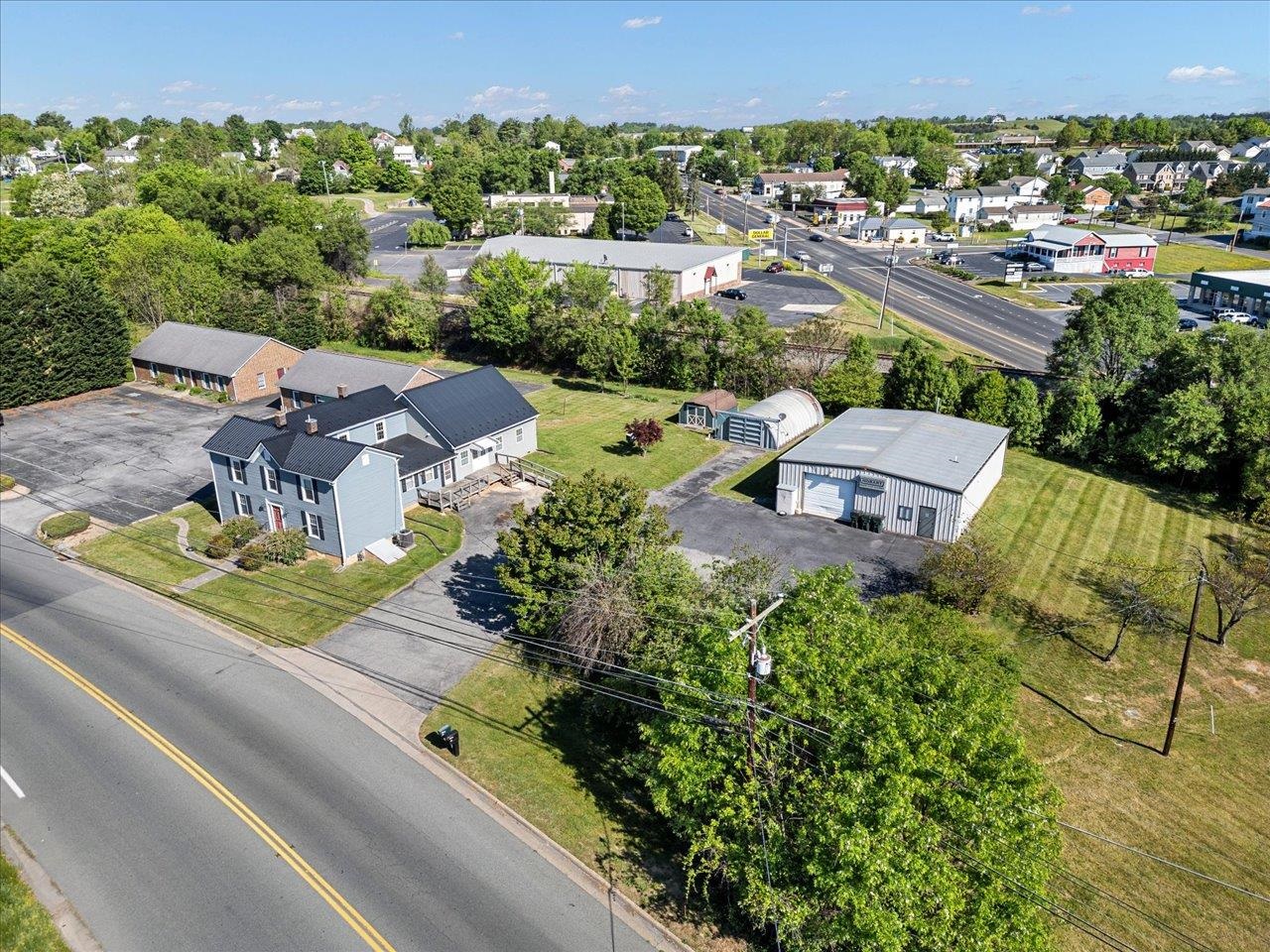 an aerial view of a house with a garden