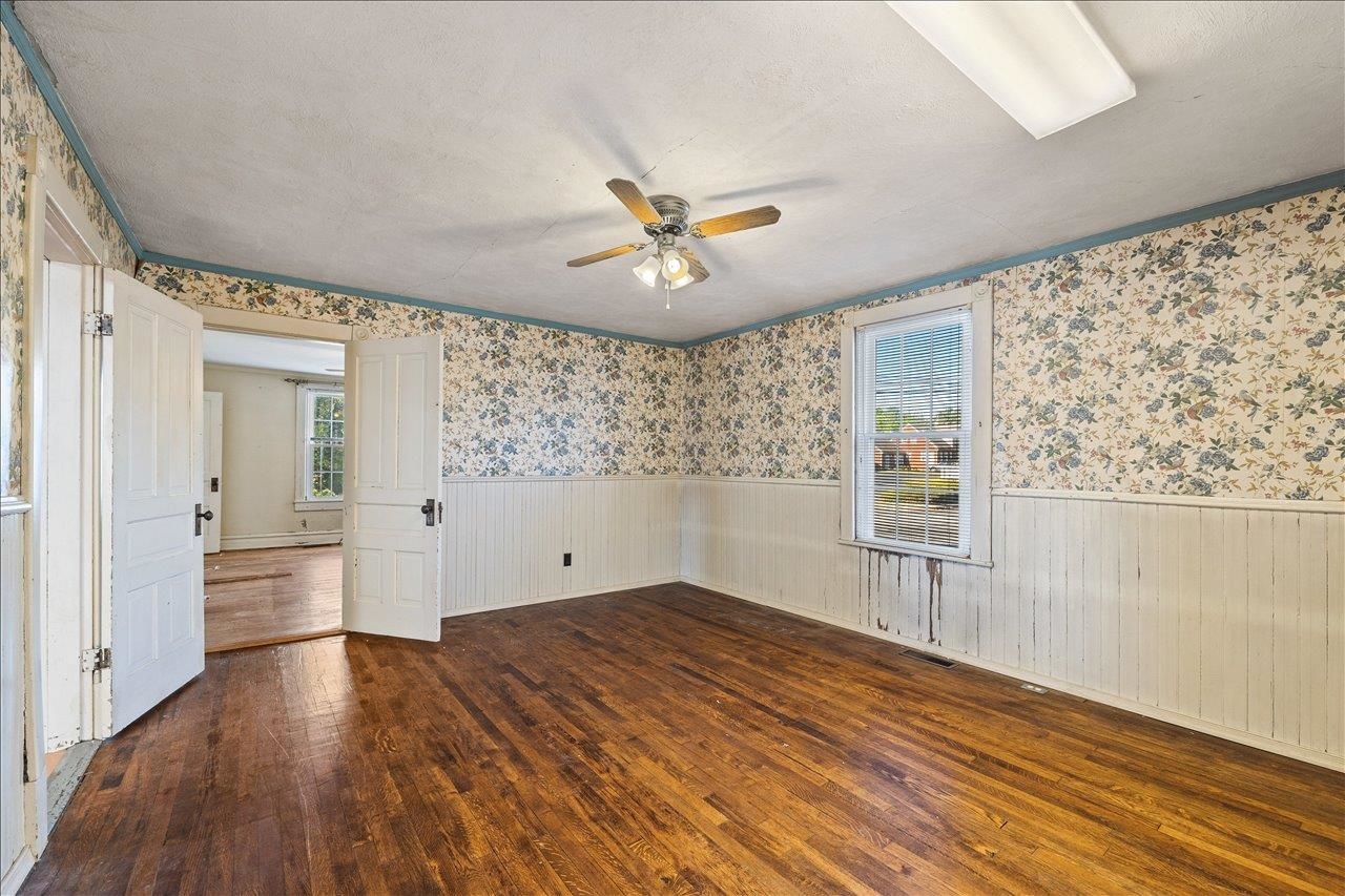 35 Tinkling Spring Road Fishersville, VA 22939 - Photo 16 of 39 wooden floor in an empty room with a window