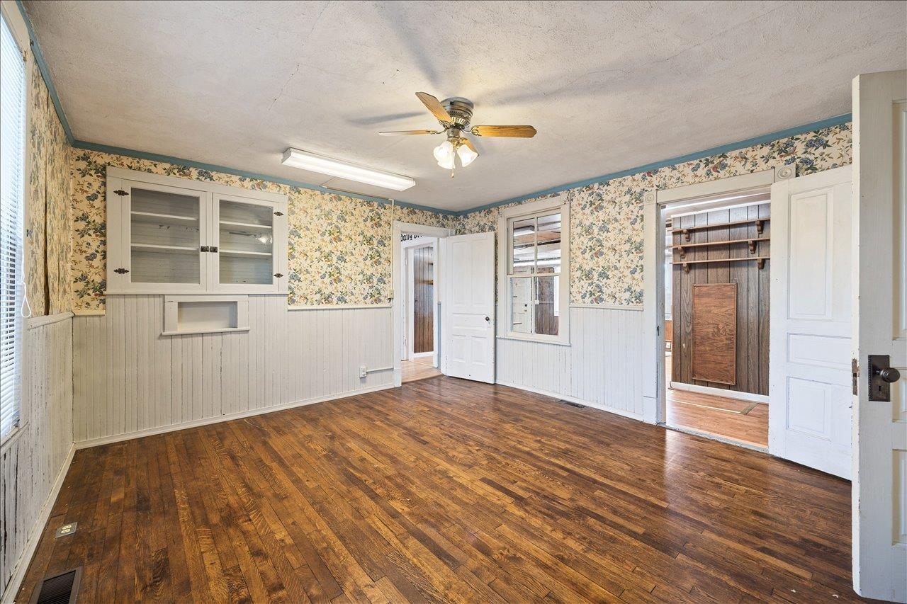 35 Tinkling Spring Road Fishersville, VA 22939 - Photo 17 of 39 wooden floor in an empty room with a window