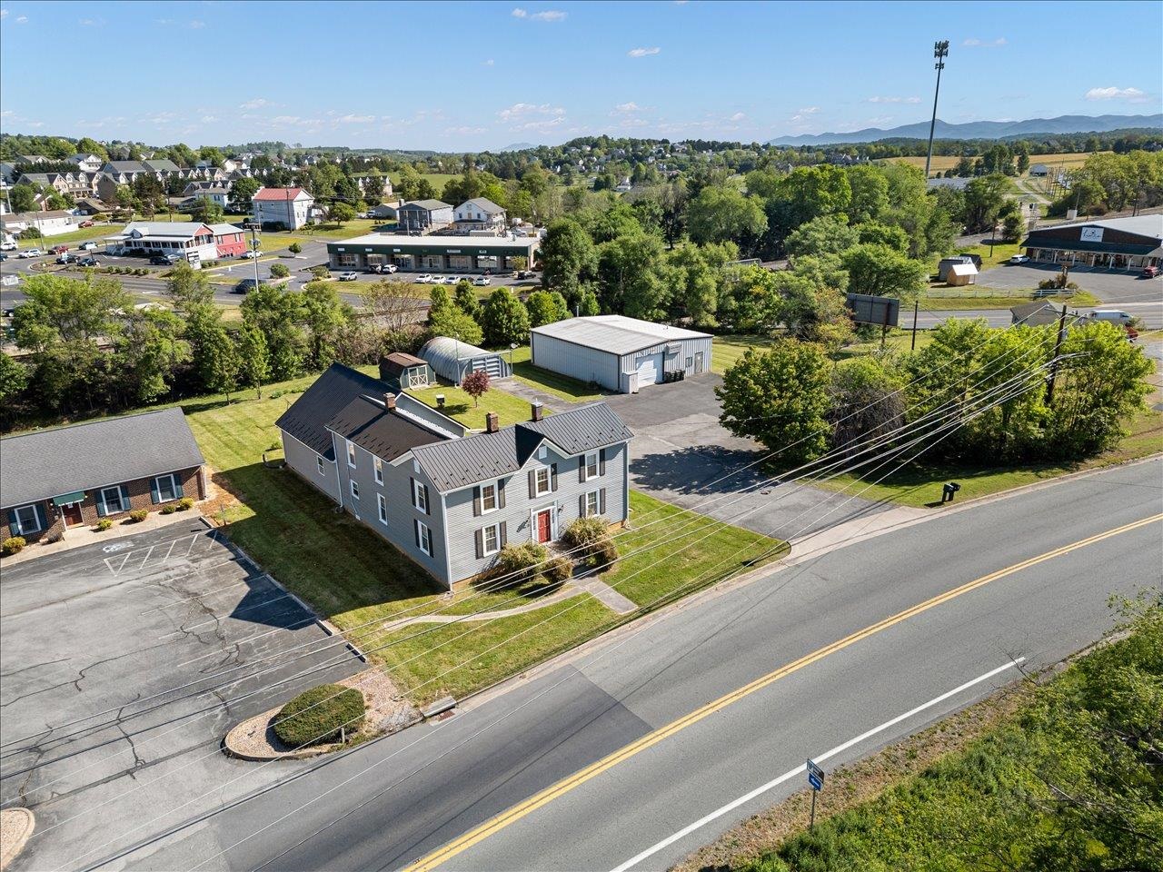 35 Tinkling Spring Road Fishersville, VA 22939 - Photo 2 of 39 an aerial view of a house with garden space and street view