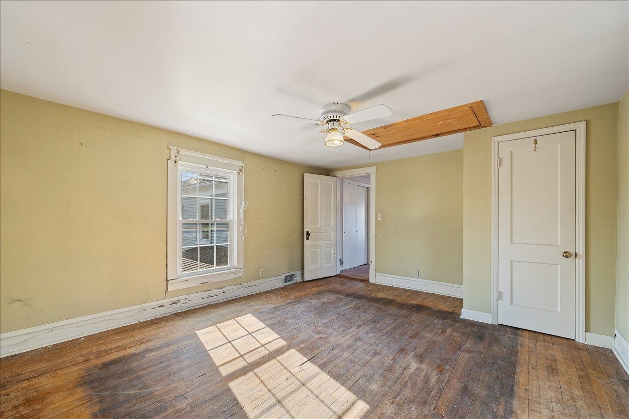 35 Tinkling Spring Road Fishersville, VA 22939 - Photo 34 of 39 a view of empty room with wooden floor and fan
