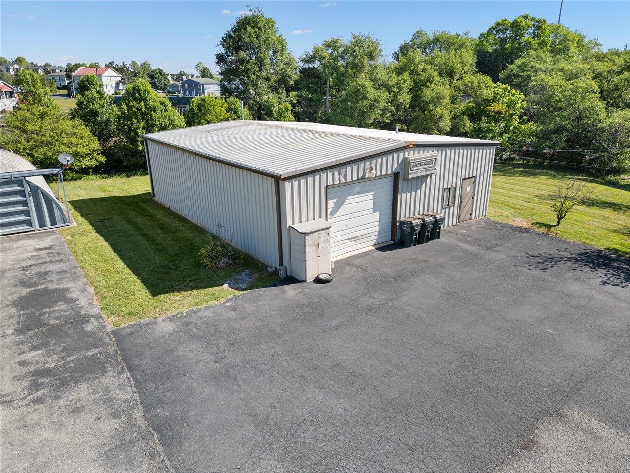 35 Tinkling Spring Road Fishersville, VA 22939 - Photo 7 of 39 a view of a house with a yard and potted plants