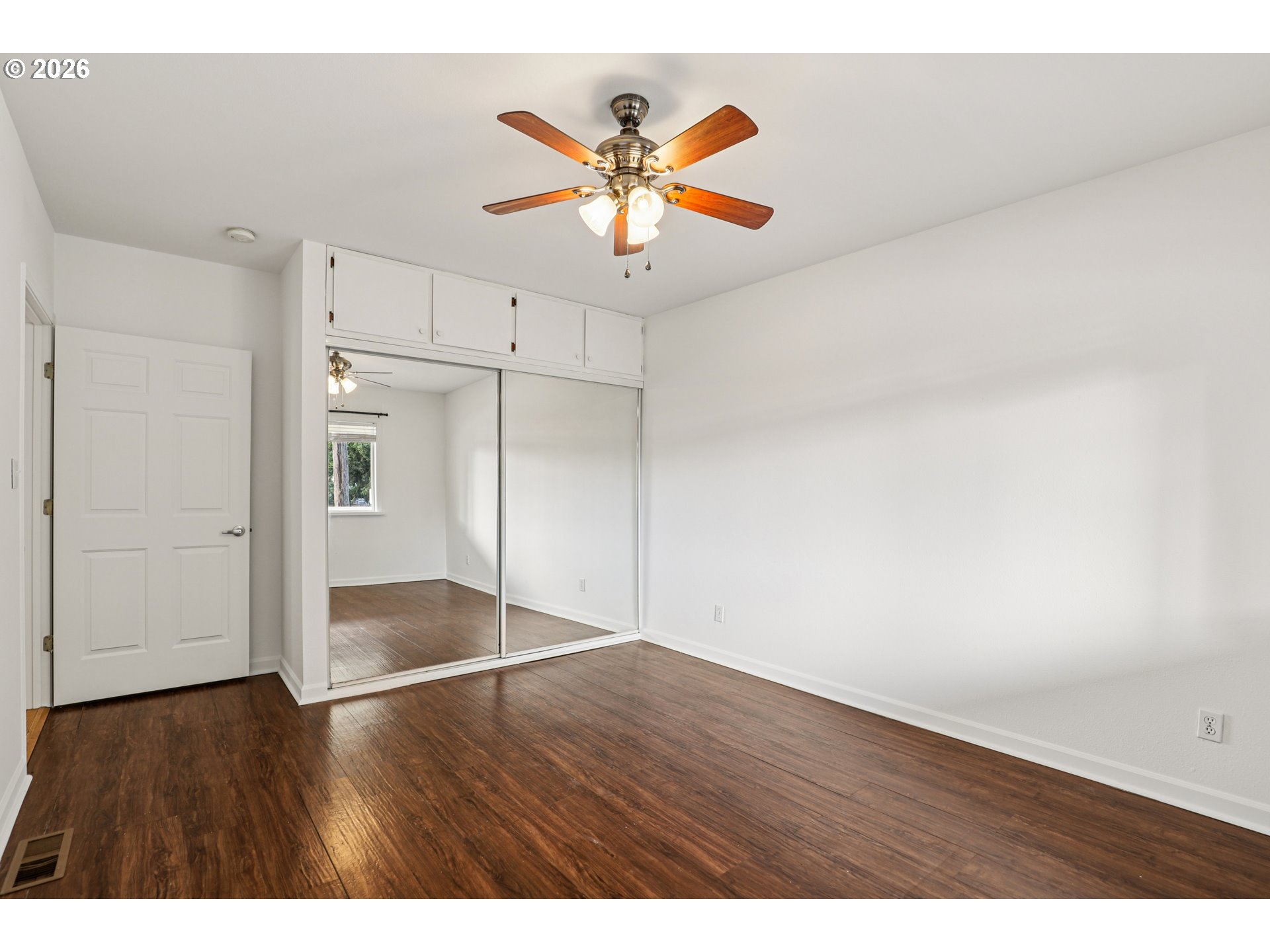 1005 Northeast 72nd Avenue Portland, OR 97213 - Photo 13 of 41 a view of an empty room with wooden floor