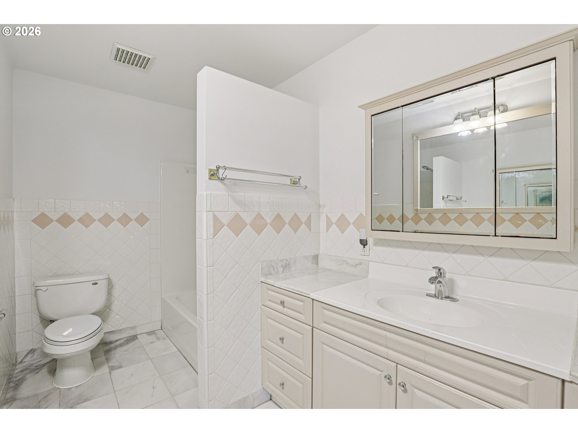 1005 Northeast 72nd Avenue Portland, OR 97213 - Photo 21 of 41 a bathroom with a granite countertop sink a toilet and a mirror