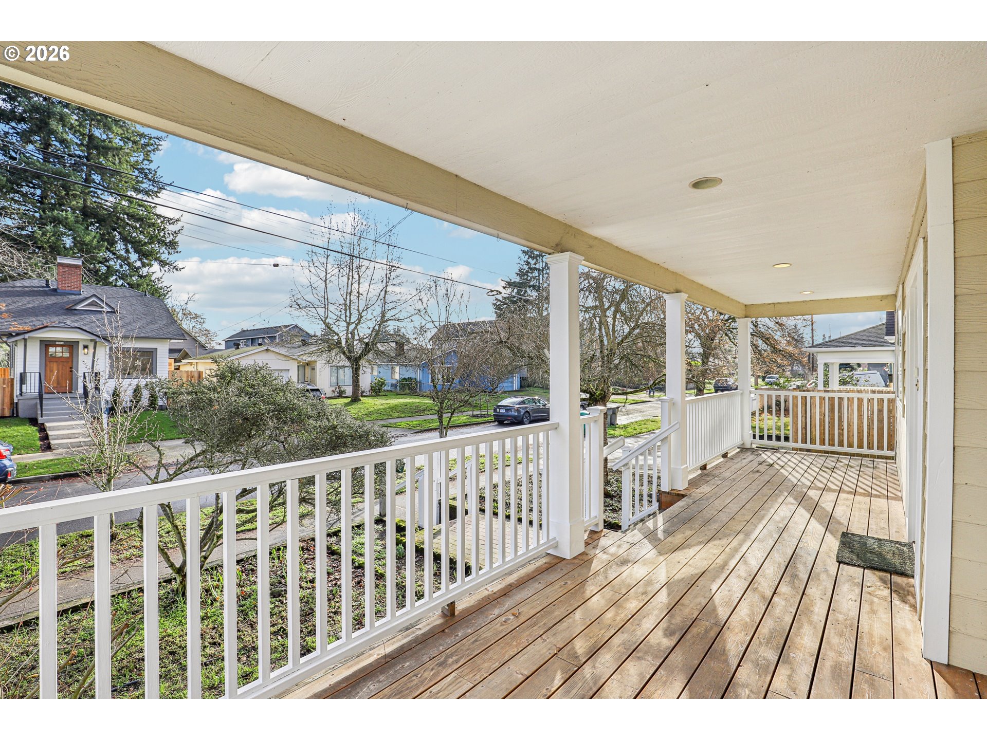 1005 Northeast 72nd Avenue Portland, OR 97213 - Photo 3 of 41 a view of balcony with floor to ceiling window and wooden floor