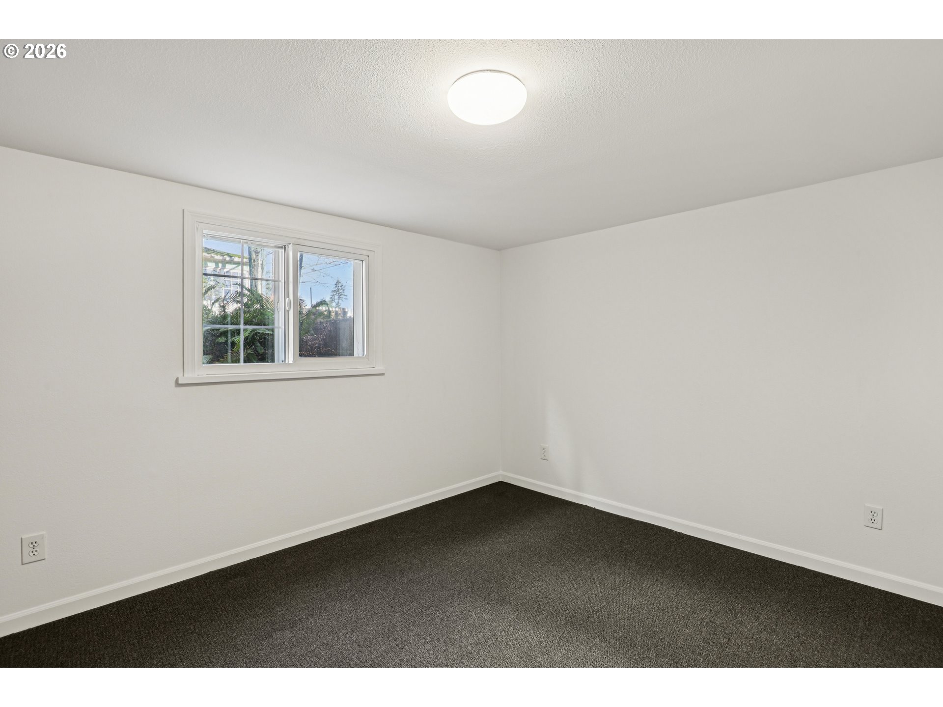 1005 Northeast 72nd Avenue Portland, OR 97213 - Photo 32 of 41 a view of an empty room with a window