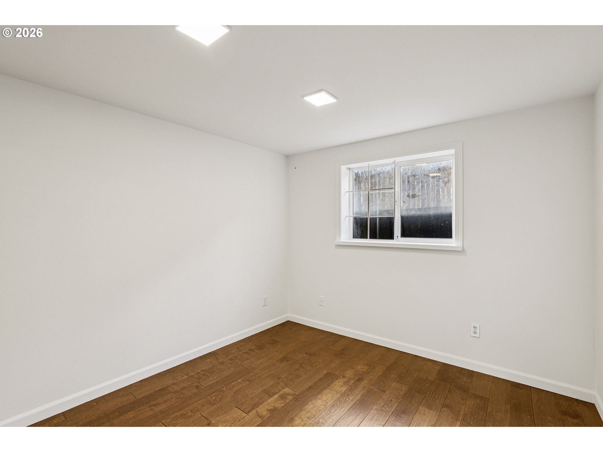 1005 Northeast 72nd Avenue Portland, OR 97213 - Photo 34 of 41 a view of empty room with wooden floor