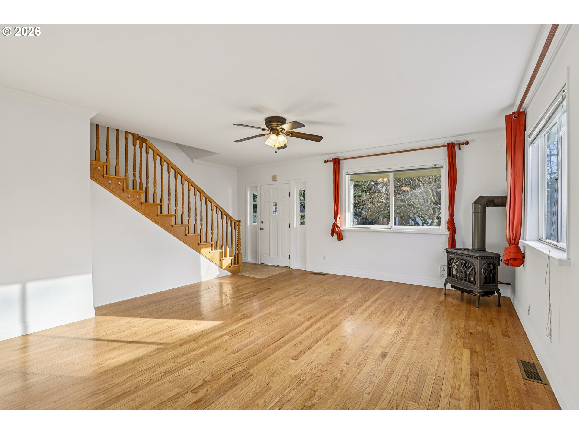 1005 Northeast 72nd Avenue Portland, OR 97213 - Photo 4 of 41 a view of an empty room with a window and wooden floor