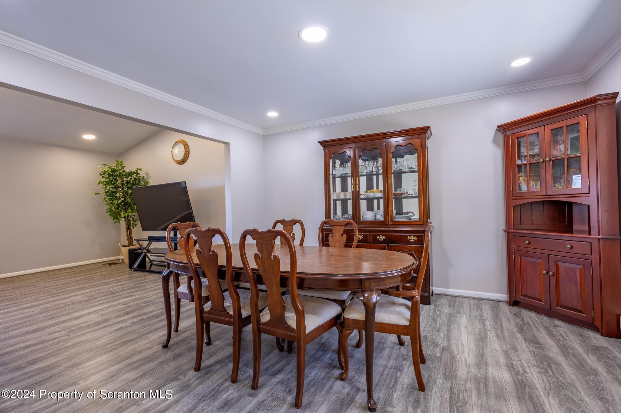 908 Violet Terrace Clarks Summit, PA 18411 - Photo 8 of 47 a view of a dining room with furniture and wooden floor