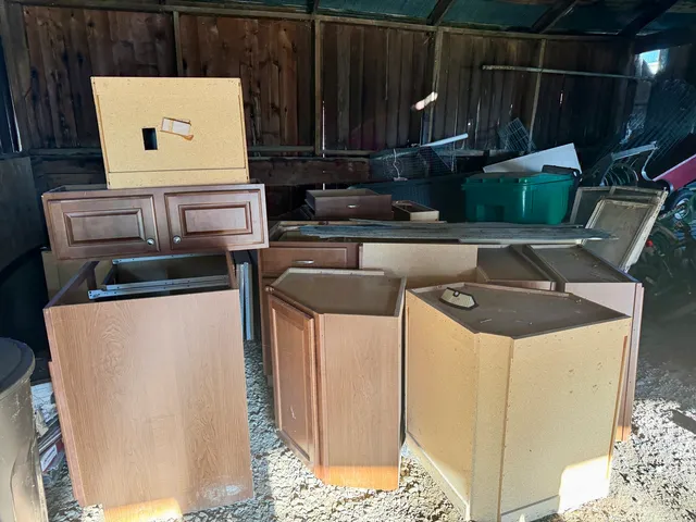 a view of living room with furniture and a fireplace