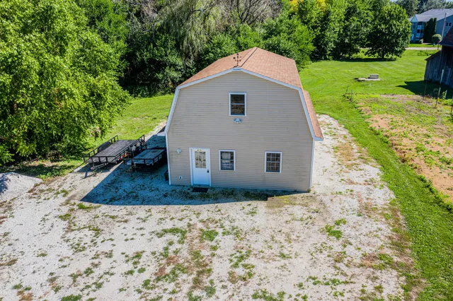 a view of a back yard of the house