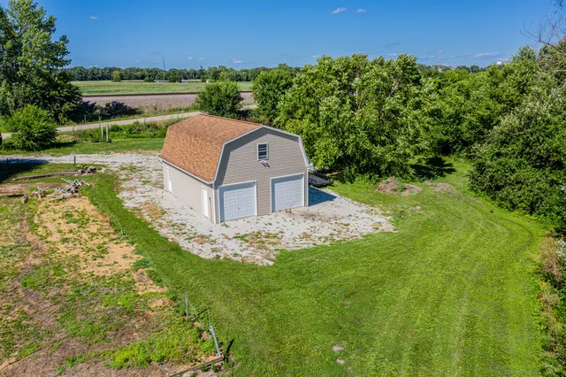 a view of a yard in front of a house with a yard