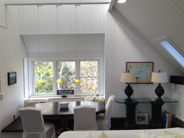 95 Litchfield Road Edgartown, MA 02539 - Photo 4 of 20 a view of a dining room with furniture and windows