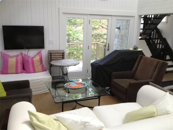 95 Litchfield Road Edgartown, MA 02539 - Photo 5 of 20 a living room with furniture and a flat screen tv