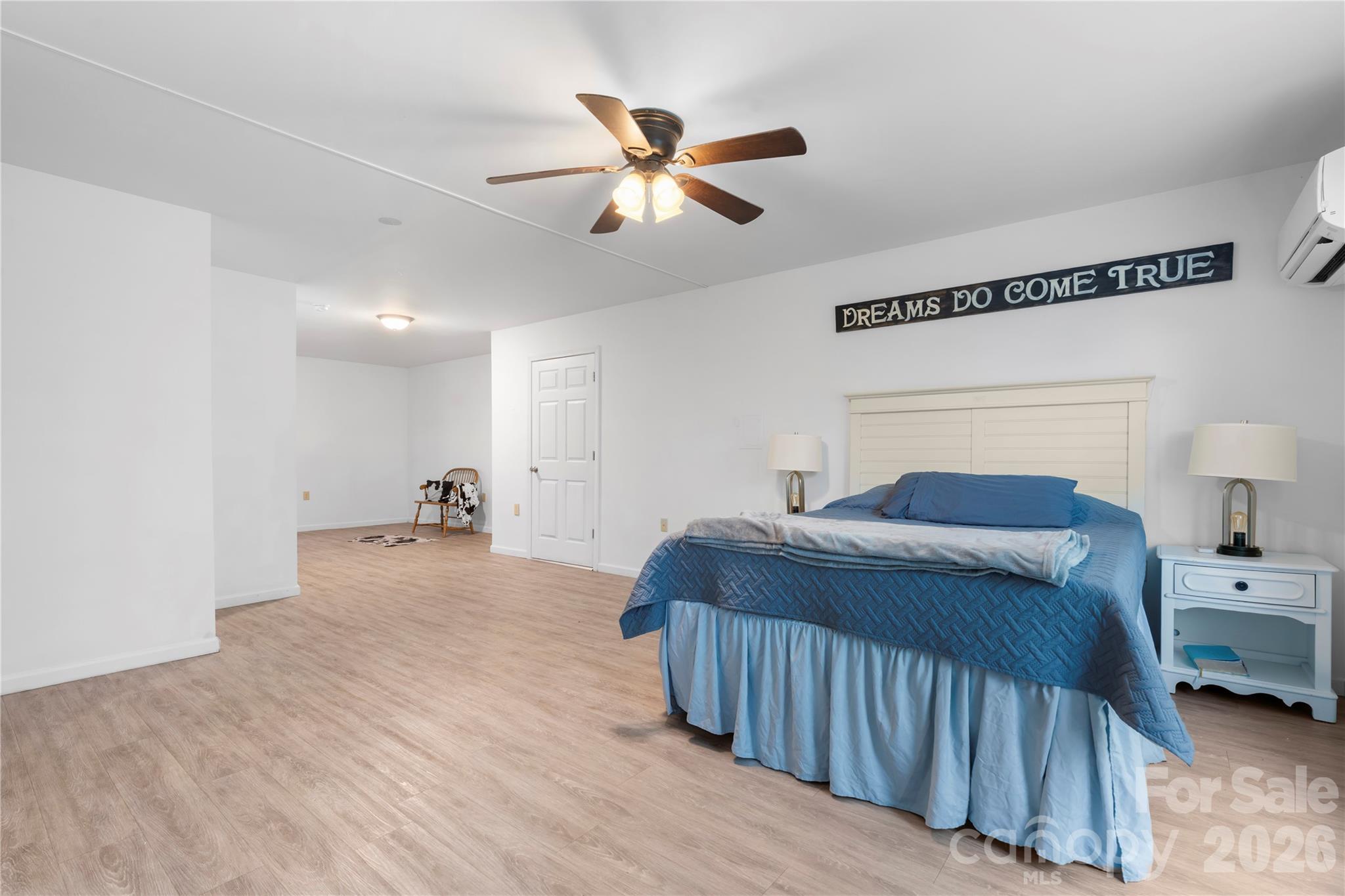 111 Pinewood Road Granite Falls, NC 28630 - Photo 29 of 33 a bedroom with a bed and ceiling fan